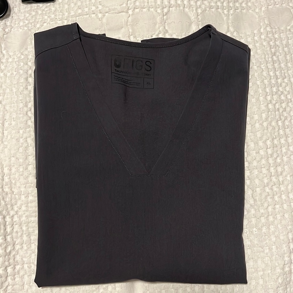 Charcoal Gray Figs scrub top. Two Pockets
